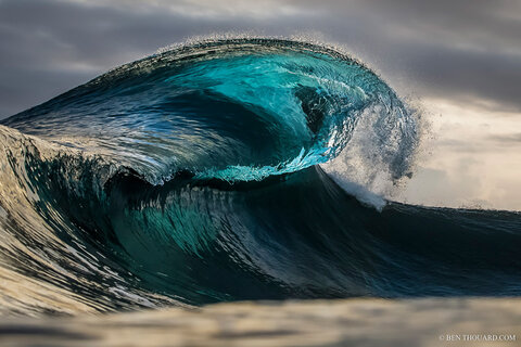 Two waves joining and breaking at the same time makes this amazing shape while the back light creates that color. Canon 1DX + 70-200mm f/2.8L IS USM II (@85mm), Aquatech Delphin 1D housing + P215 front port. ISO 320, f/5.6, 1/1600
